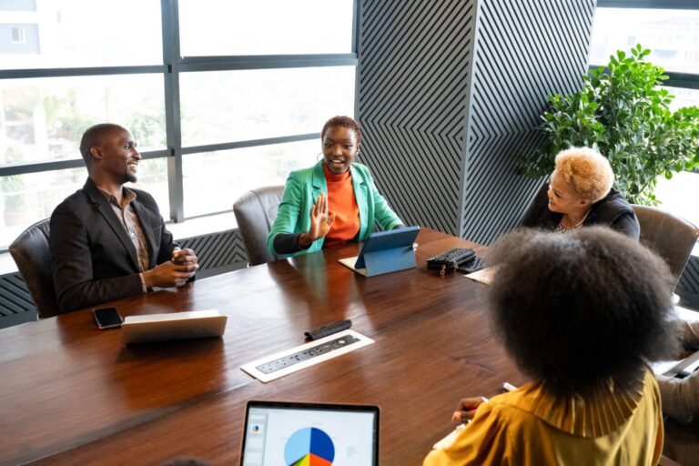 A team of African HR professionals collaborating during a strategic workforce planning meeting, representing leadership, organizational change, and professional HR practice.
