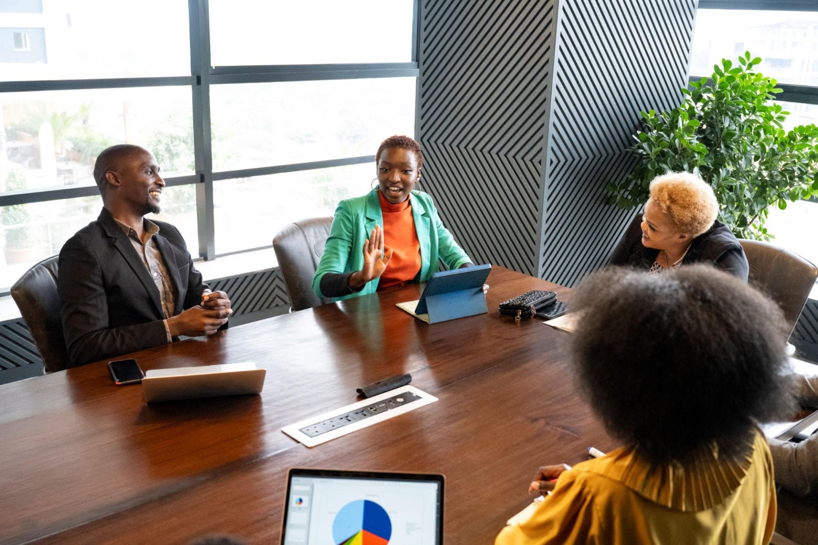 A team of African HR professionals collaborating during a strategic workforce planning meeting, representing leadership, organizational change, and professional HR practice.